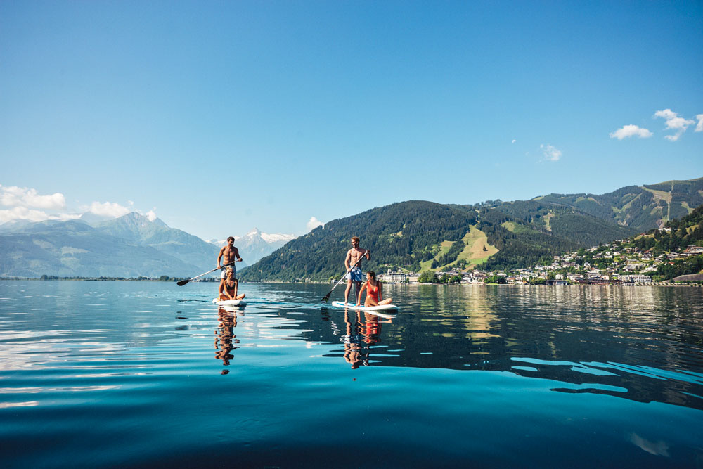 city-penthouse Seeblick web_stand-up-paddling-am-zeller-see---stand-up-paddling-at-lake-zell-c-zell-am-see-kaprun-tourismus